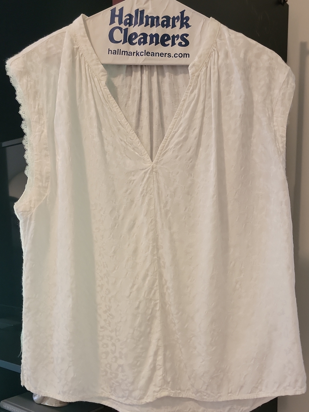 White Sleeveless V-Neck Blouse